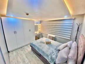 IV’s Condo w/ Netflix, Wifi & Karaoke